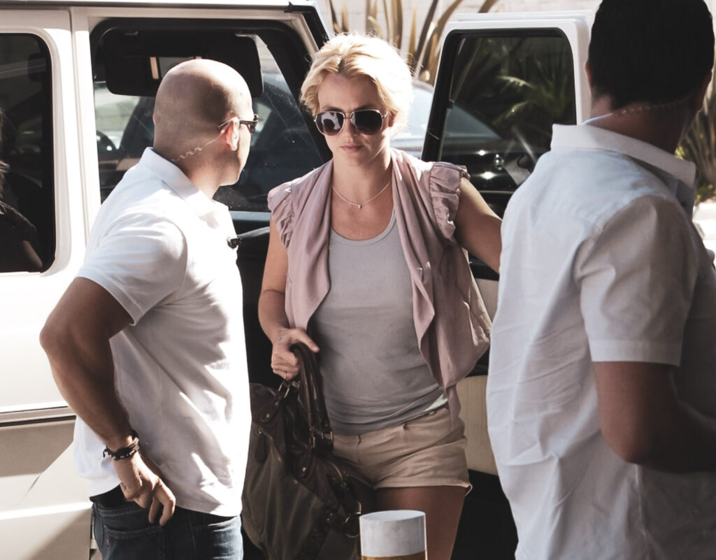 Britney Spears watched by security